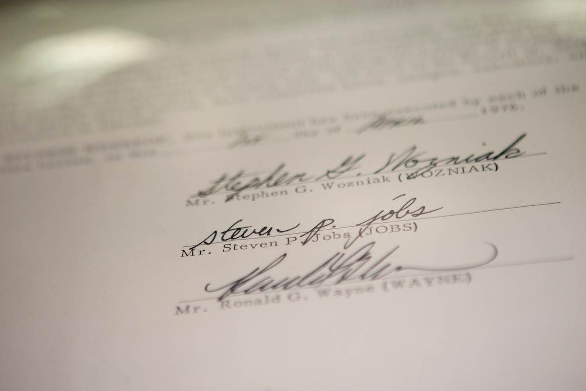 The signatures of Steve Wozniak, Steve Jobs and Ronald Wayne on Apple's original partnership agreement.