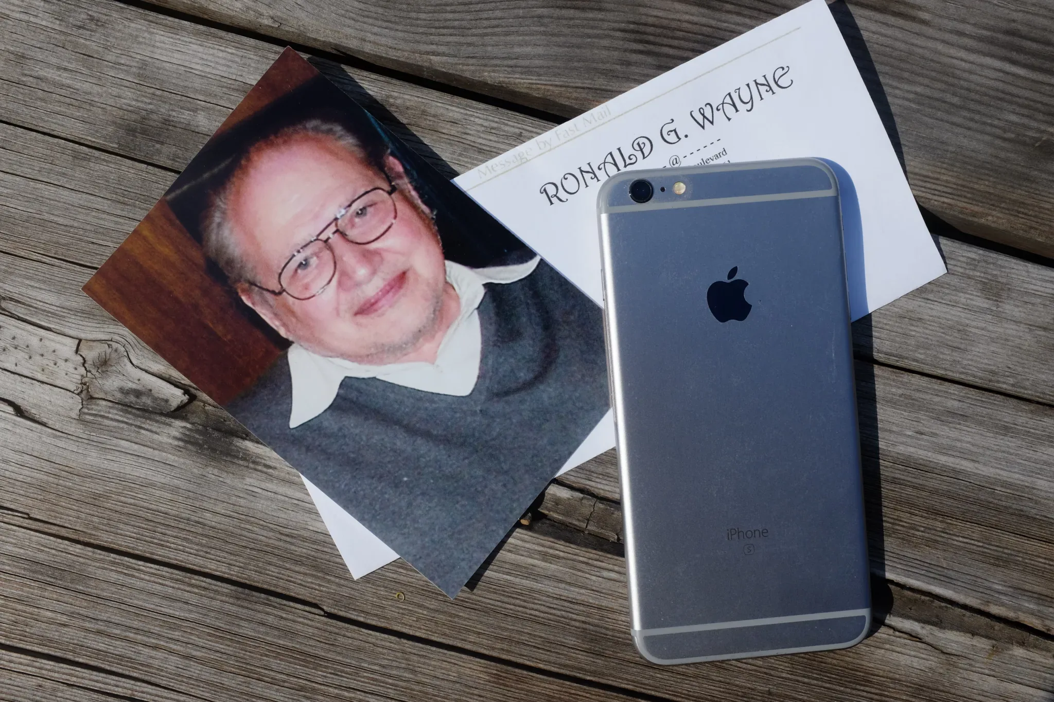 Archival photographs and objects associated with Ronald Wayne.